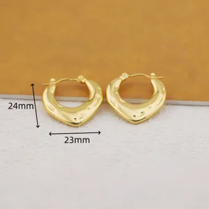 Detail view of gold plated stainless steel heart hoop earrings with size dimensions 24x23mm.