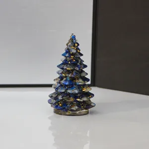 Exquisite blue gold crystal stone Christmas tree figurine detail showcase for holiday desk decor.