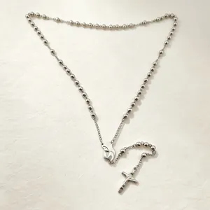 Stainless steel 6mm bead long rosary necklace with retro cross pendant detail shot.