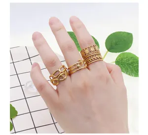 Gold stackable rings set, geometric hollow out design, fashion titanium steel rings for women.