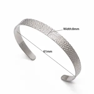 Stainless steel open cuff bracelet with hammered textured matte finish, width 8mm, size 61mm.