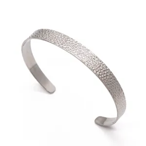 Detailed close-up view of the hammered texture stainless steel open cuff bracelet.