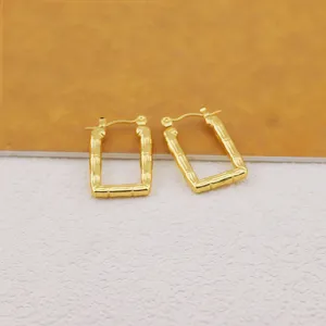 Gold plated rectangular bamboo hoop earrings, elegant fashion jewelry for women daily wear.