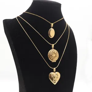 Gold stainless steel locket pendant necklace set featuring oval, round and heart shaped designs.
