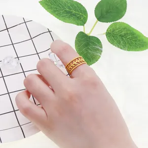 Minimalist stackable gold titanium steel ring with hollow leaf design for daily wear