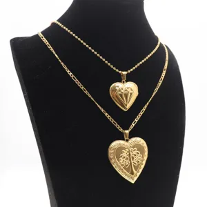 Gold stainless steel double layer heart locket pendant necklace set with diamond and tree pattern.