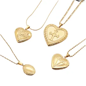 Gold stainless steel locket necklace set with vintage embossed heart and cross pendants.