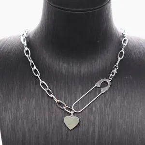 Detail shot of punk style titanium steel heart safety pin pendant necklace for women