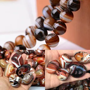 Natural banded agate gemstone raw stone hand play piece and round beads details display.