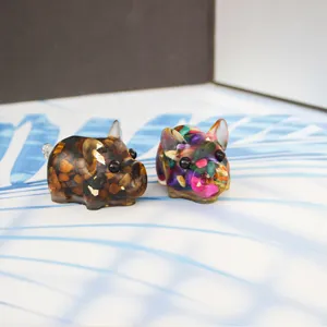Detailed shot of cute resin pig figurine filled with natural crystal chips for home decor