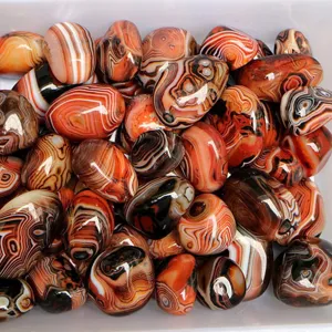 Natural banded agate polished stones, beautiful red and black crystal mineral specimens.