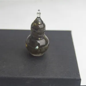 Detailed view of mini gourd crystal stone ornament, ideal for elegant desktop decoration.