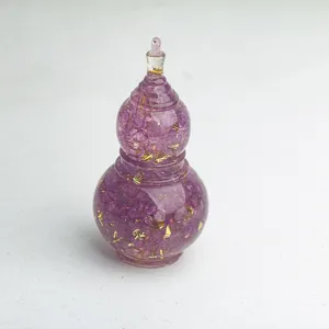 Crystal resin gourd detail showcasing purple crystal chips and gold foil flakes inside