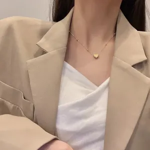 Chic stainless steel heart pendant necklace for women, stylish minimalist clavicle chain.
