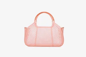 Pink translucent PVC mesh jelly handbag detail, featuring a stylish hollow design and round handle.