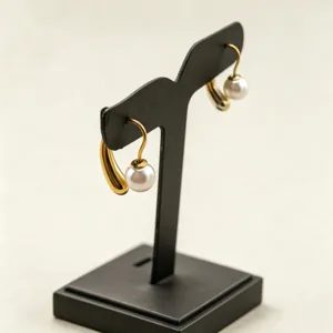 Chic stainless steel imitation pearl earring hooks with retro teardrop design for women.