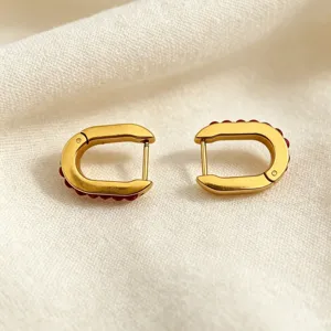 Minimalist U-shaped stainless steel earrings with elegant red bead accents for daily wear.