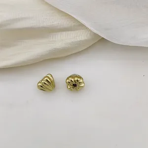 Gold-plated lotus spacer beads for DIY jewelry making, necklace and bracelet charms.