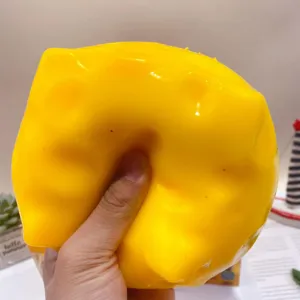 Close-up detail of the creative big yellow cheese shape squishy toy, soft stress relief fun.