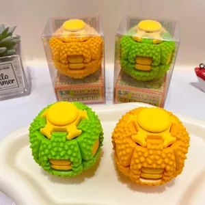 Close-up detail of creative durian shape fidget spinner decompression toy, yellow and green.