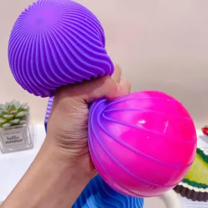 Giant corrugated color-changing stress relief toy, soft maltose squeeze ball for sensory fun.