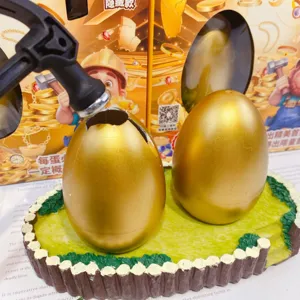 Children DIY golden egg smashing toy set with base and hammer blind box fun puzzle gift play.
