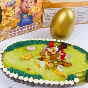 Creative golden egg smashing toy blind box children puzzle toy with jewelry pieces inside.