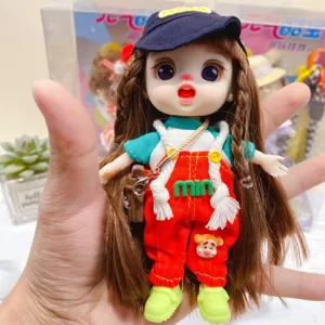 Cute vinyl doll keychain, multi-joint movable fashion accessory for bags and keys.