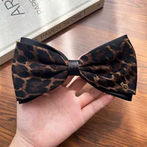 Retro leopard print hair bow clip with metal puppy charm, elegant ponytail spring clip