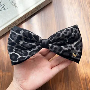 Retro leopard print bow hair clip with gold dog charm elegant ponytail spring barrette for women