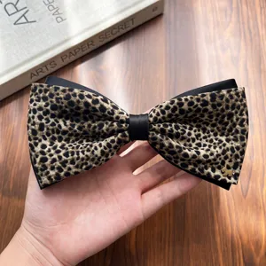 Retro leopard print bow hair clip with chic metal dog detail, stylish ponytail spring barrette.