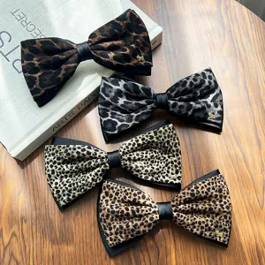 Leopard print bow hair clip, stylish retro ponytail clip with cute golden puppy charm for women.