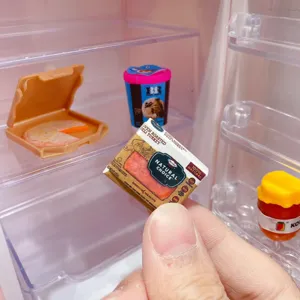 Miniature toy refrigerator blind box set detail showing cute mini food packaging and items.