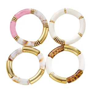 Ensemble de bracelets élastiques en tube acrylique rétro doré pour femmes élégantes.