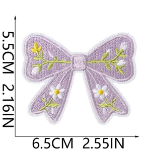 Detailed view of the purple bow embroidered patch with floral pattern and clear size dimensions.