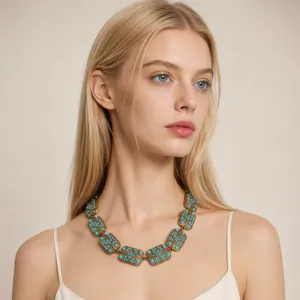 Vintage bronzen geometrische turquoise vierkante schakelketting detail voor dames.