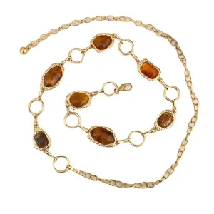 Dames vintage goudkleurige metalen tailleketting met amberkleurige stenen riem