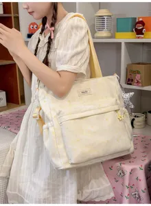 Cute star print canvas shoulder backpack detail showing large capacity and multi pockets.