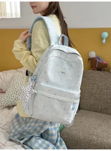 Cute star print casual school backpack for students, large capacity daily book bag.