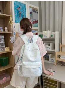 Cute blue star print canvas backpack for school girls, spacious casual daily daypack and bag.