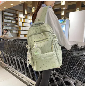 Zaino scolastico leggero con stampa di stelle, scomparti multipli e tasca per ragazze in viaggio.