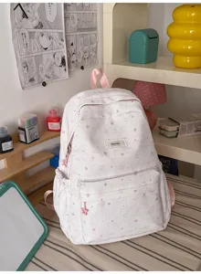 Cute star print canvas backpack for teens, large capacity school bag for girls, casual daypack.