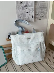 Cute star print canvas tote backpack student school bag detail view showing front pocket