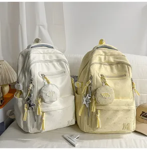 Zaino casual con stampa di stelle multi-comparto per scuola viaggio e uso quotidiano.