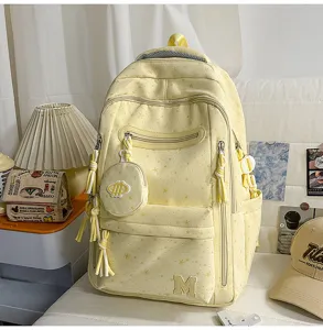 Zaino con stampa a stelle gialle con scomparti multipli, tasca carina, ideale per studenti e viaggi.