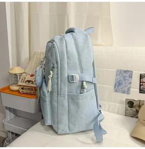 Zaino estetico azzurro chiaro con motivo a stelle, borsa scolastica grande multifunzionale.