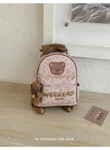 Pink leopard print mini backpack with cute bear patch, bow detail and shoulder straps.