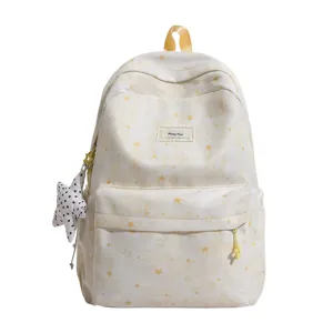 Cute star print canvas backpack with large capacity for daily school and casual use.
