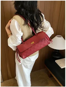 Retro pu leather quilted shoulder bag for women, casual horizontal baguette handbag commuting.