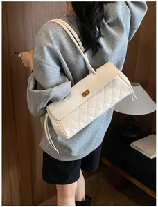 White quilted PU leather shoulder bag for women, elegant commuter tote with turn-lock closure.